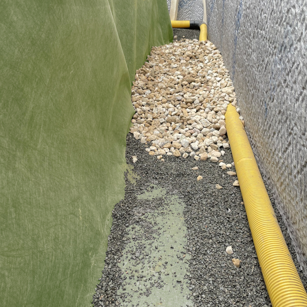 EcoFilter Vlies für Drainage an Kiesbereich mit Rohrleitung