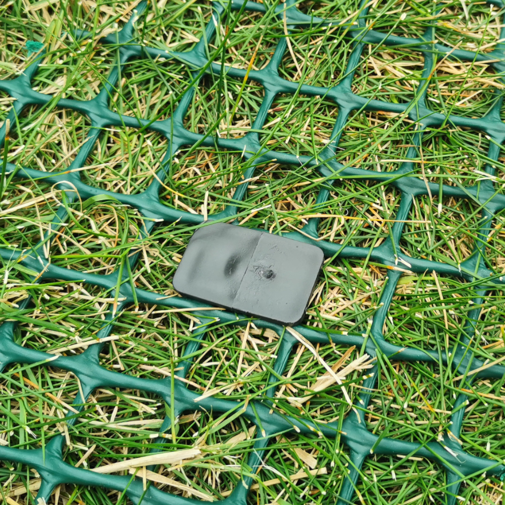 Befestigung von Rasengitter