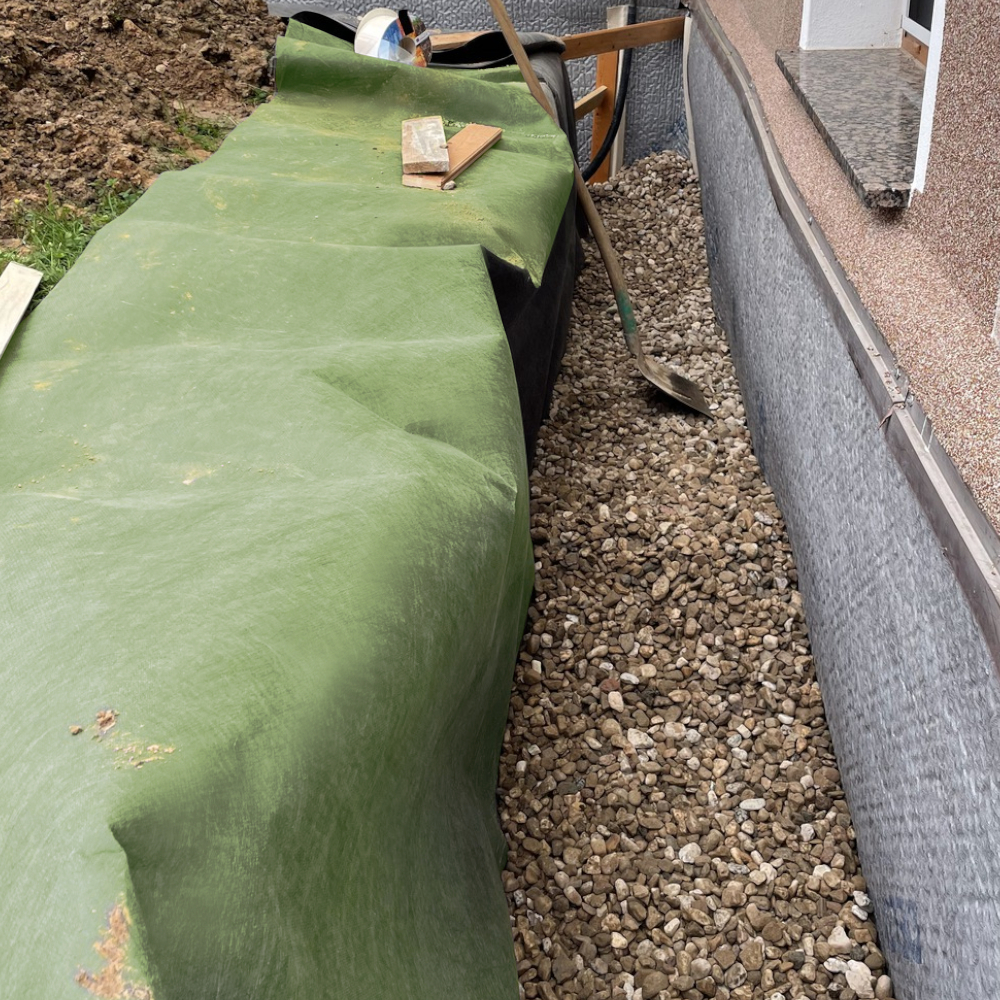 Einbau EcoFilter Filtervlies bei Kiesfläche