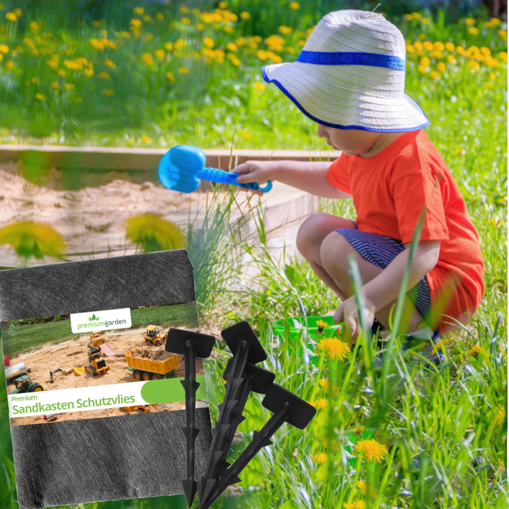 Sandkasten Schutzvlies mit Pins vor spielendem Kind in Sandkasten auf Wiese