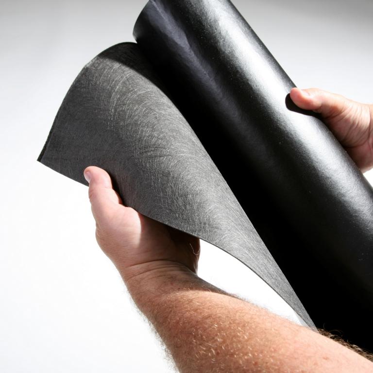 Wurzelsperre auf Rolle: Eine Seite rau, eine glatt